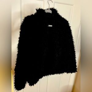 Black shaggy fur coat